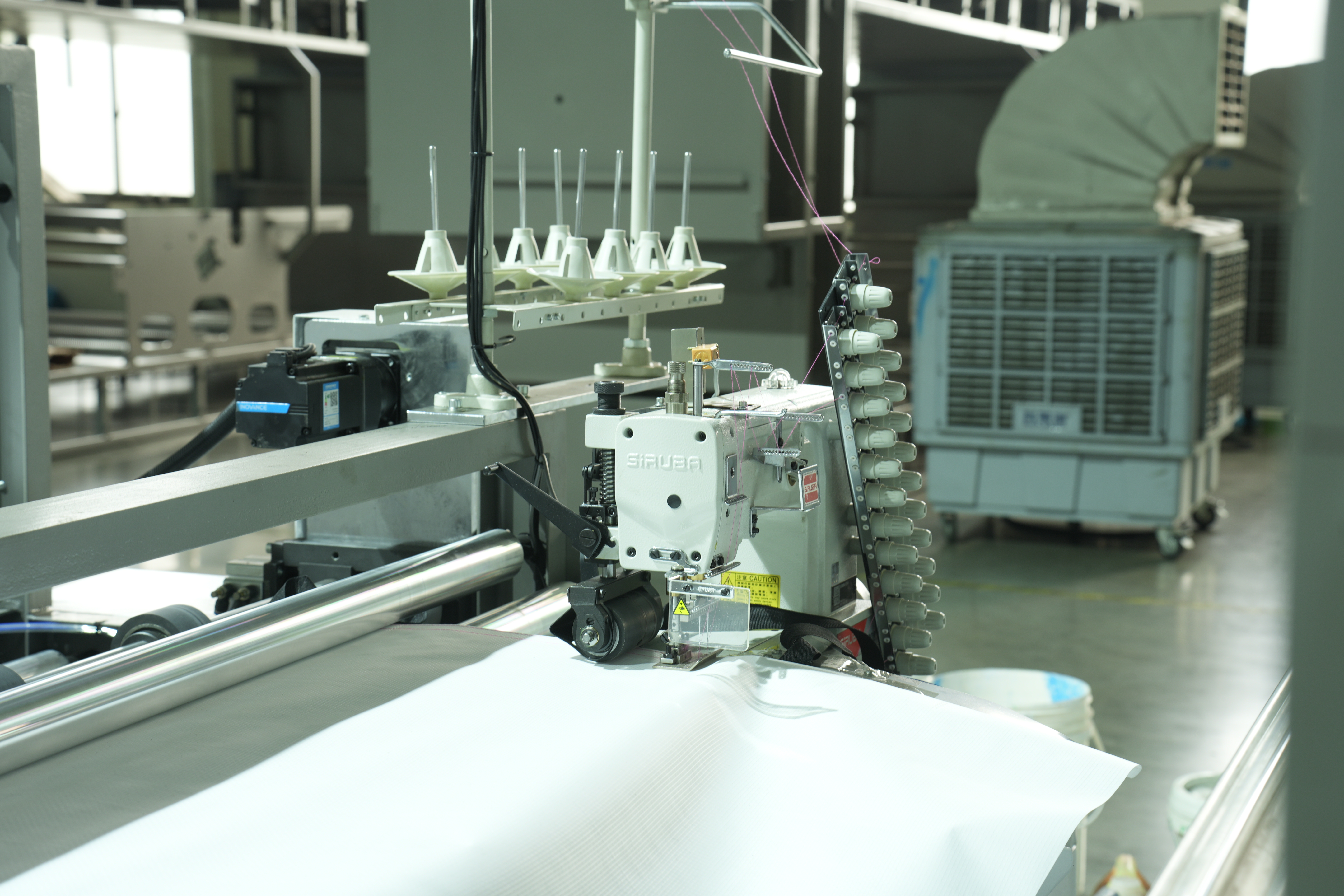 ONL-XG1200 การเย็บและตัดเย็บแบบสองด้านที่ไม่ได้ทอ